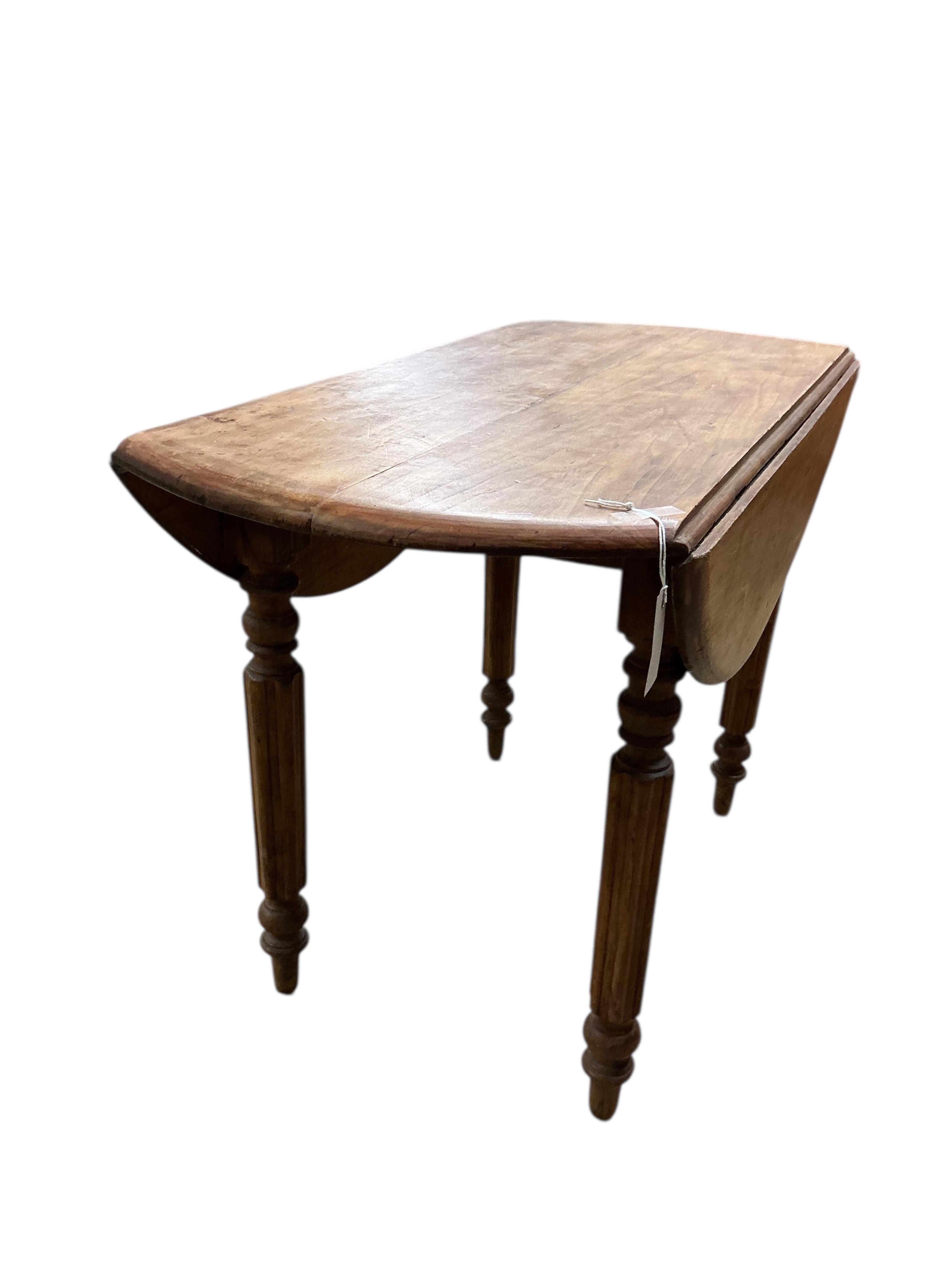 A 19th century French fruitwood drop flap table, width 98cm, depth 49cm, height 66cm